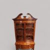 Edwardian inlaid serpentine bookcase top view
