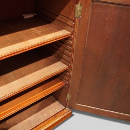 George III mahogany breakfront bookcase adjustable shelves