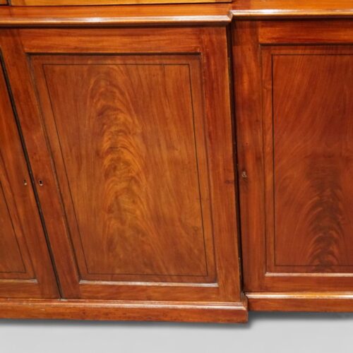 George III mahogany breakfront bookcase base