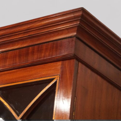 George III mahogany breakfront bookcase cornice