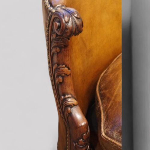 Pair of Edwardian leather sofas arm detail