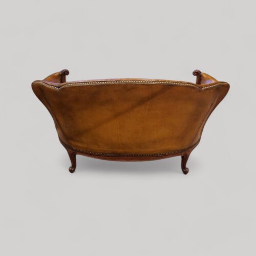 Pair of Edwardian leather sofas rear