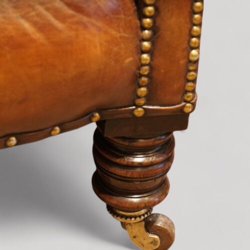 Victorian leather club chair turned leg