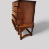 Antique walnut chest on stand drawers open