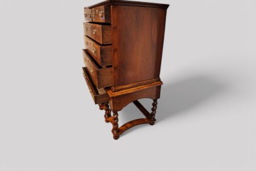 Antique walnut chest on stand drawers open