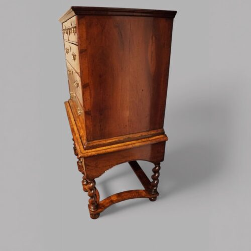 Antique walnut chest on stand side