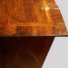 Antique walnut chest on stand top corner