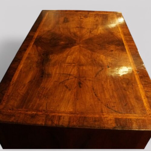 Antique walnut chest on stand top surface