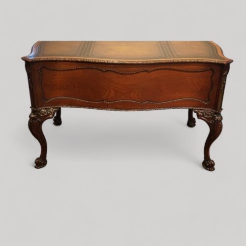 Chippendale style mahogany serpentine desk rear