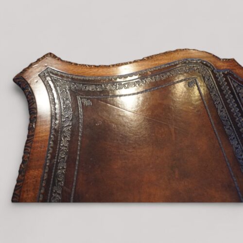 Chippendale style mahogany serpentine desk tooling