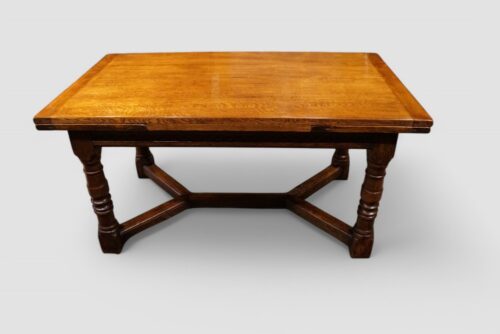 Oak refectory draw leaf dining table closed