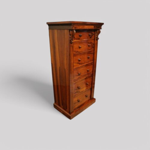 Victorian rosewood Wellington chest at angle