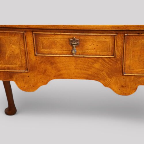 Queen Anne style walnut lowboy centre drawer