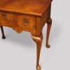 Queen Anne style walnut lowboy front leg