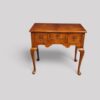 Queen Anne style walnut lowboy front view