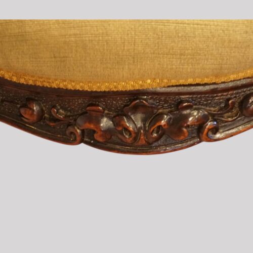 Victorian mahogany open arm chair apron carving