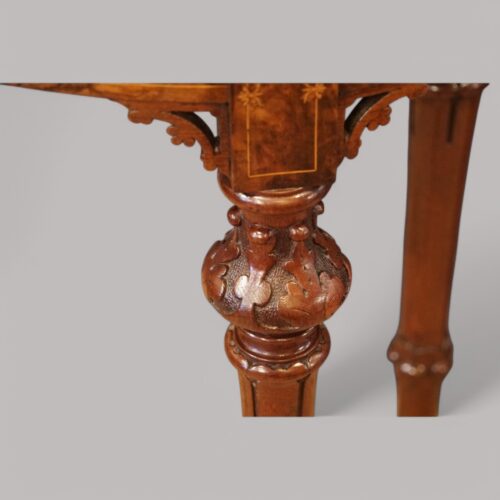 Victorian inlaid walnut oval table top of leg
