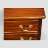 Pair of mahogany bedside chests top moulding