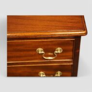 Pair of mahogany bedside chests top moulding