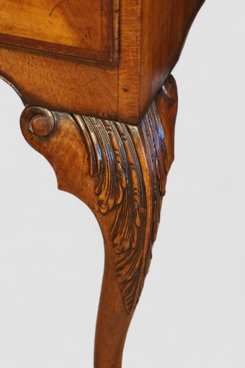 Queen Anne style walnut cabinet carved knee