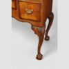 Queen Anne style walnut cabinet front leg