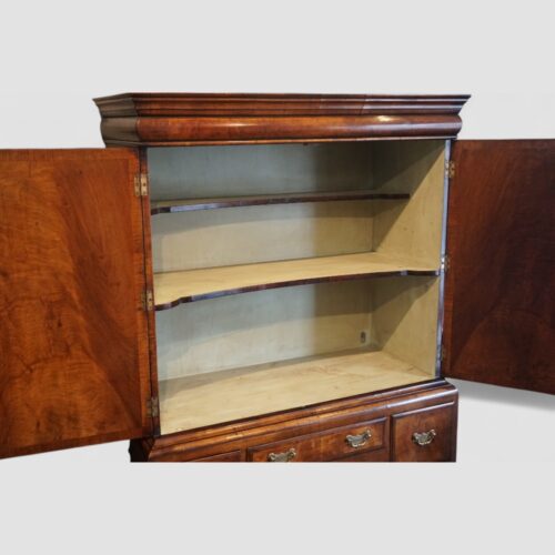Queen Anne style walnut cabinet interior