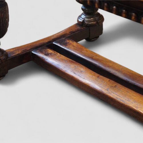 Victorian oak draw leaf dining table in the Elizabethan style double stretcher