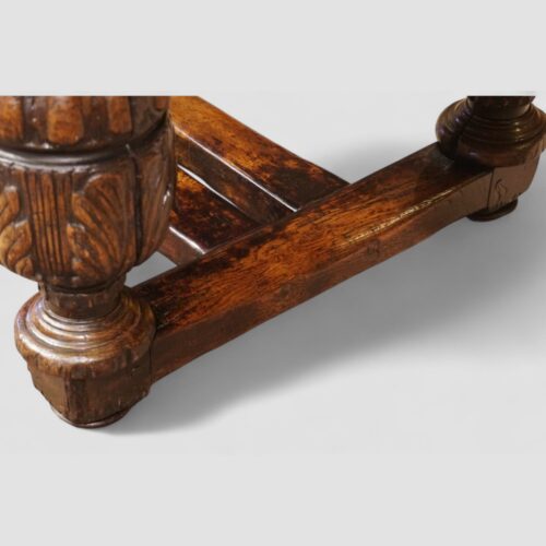 Victorian oak draw leaf dining table in the Elizabethan style end base detail