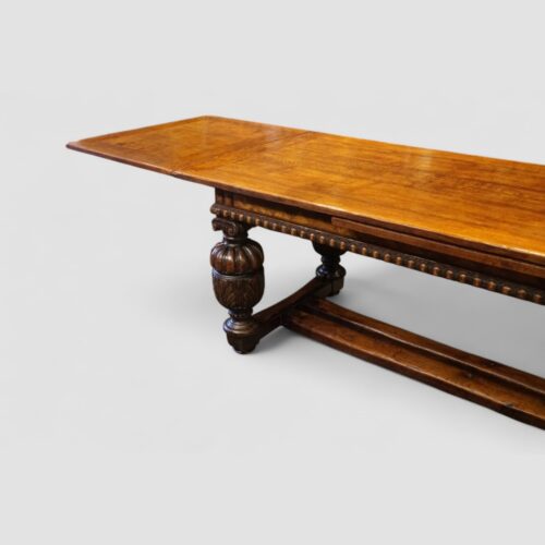 Victorian oak draw leaf dining table in the Elizabethan style end leaf open