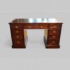 Edwardian mahogany pedestal desk front