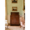 Regency mahogany inlaid chiffonier in classic interior