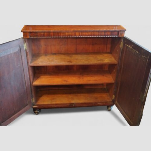 Regency mahogany inlaid chiffonier interior