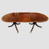 Twin pillar dining table with cross banding