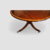 Twin pillar dining table with cross banding corner