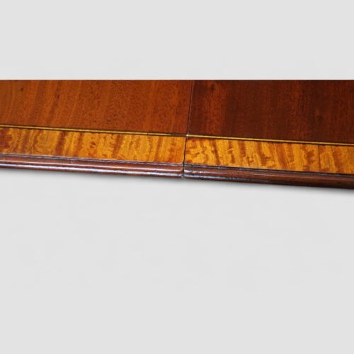 Twin pillar dining table with cross banding detail edge