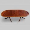 Twin pillar dining table with cross banding