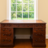 Victorian mahogany pedestal desk in a study