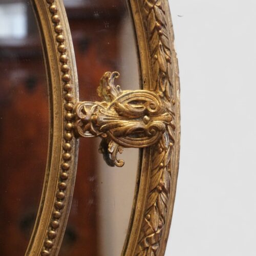 19thc. oval gilt framed mirror edge detail