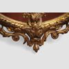 19thc. oval gilt framed mirror lower carving detail