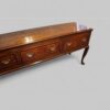Antique oak cabriole leg dresser base at angle