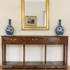 Antique oak cupboard dresser base in room setting