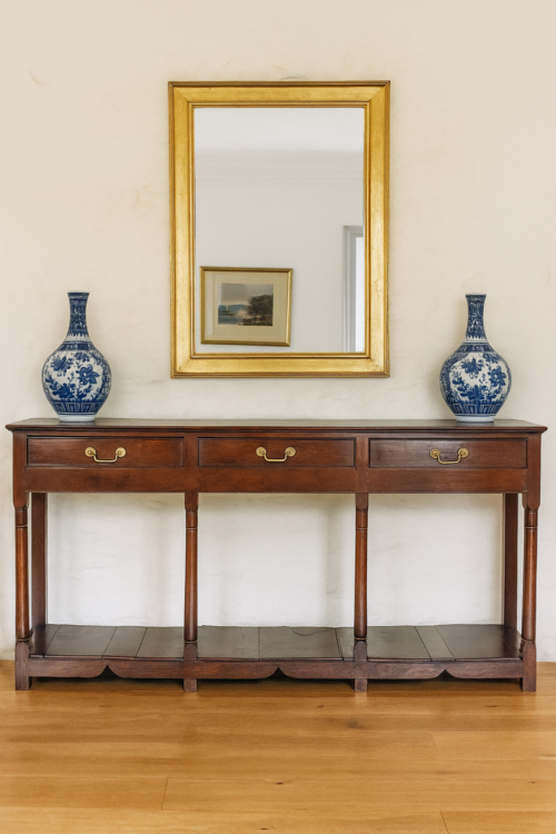 Antique oak cupboard dresser base in room setting