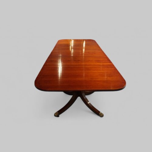 Large George V mahogany inlaid dining table end view