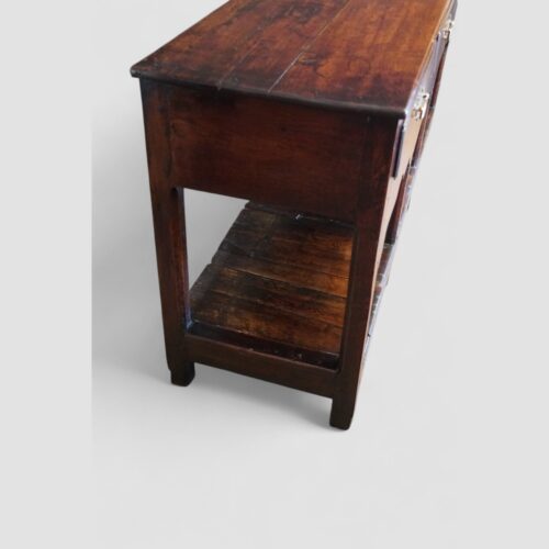 Antique oak dresser base with pot board end view