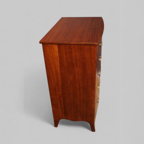 George VI mahogany bow front chest end view