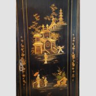 Pair of black lacquer Chinoiserie cupboards right panel detail