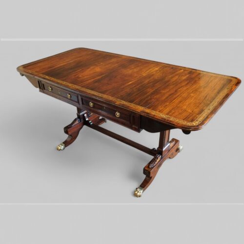 Regency brass inlaid rosewood sofa table at an angle