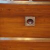 Brass bound yew wood serving cabinet flush handle