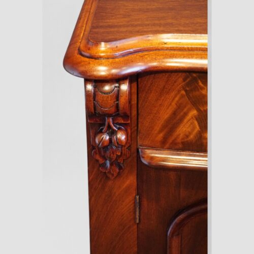 Victorian mahogany serpentine chiffonier corbel