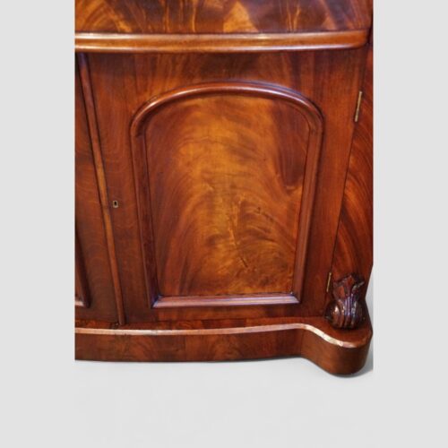 Victorian mahogany serpentine chiffonier door